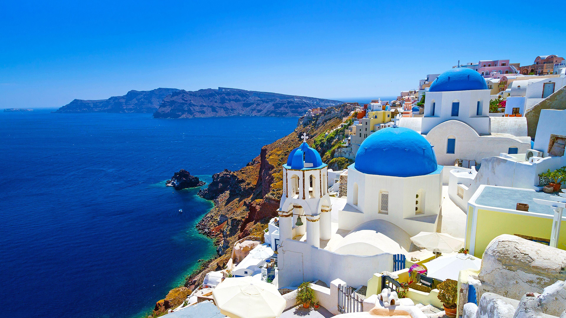 View of Santorini. Virtual background to use on Zoom, Microsoft Teams, Skype, Google Meet, WebEx or any other compatible app.